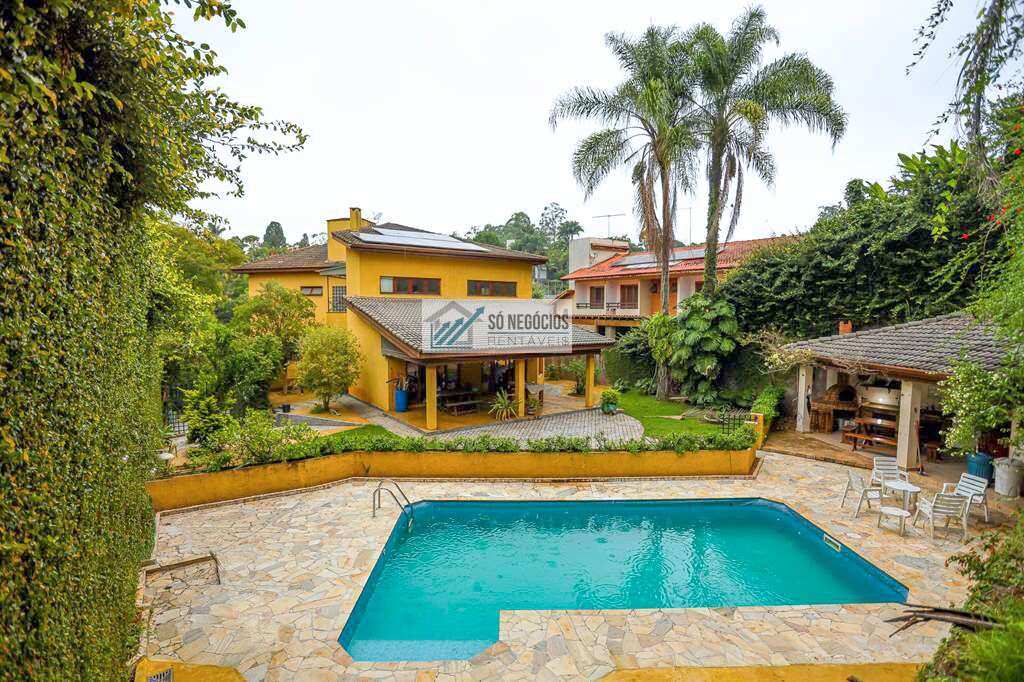 Casa rústica à venda na Granja Viana II em Cotia com 4 suítes, piscina, energia solar e espaço gourmet - Só Negócios Rentáveis